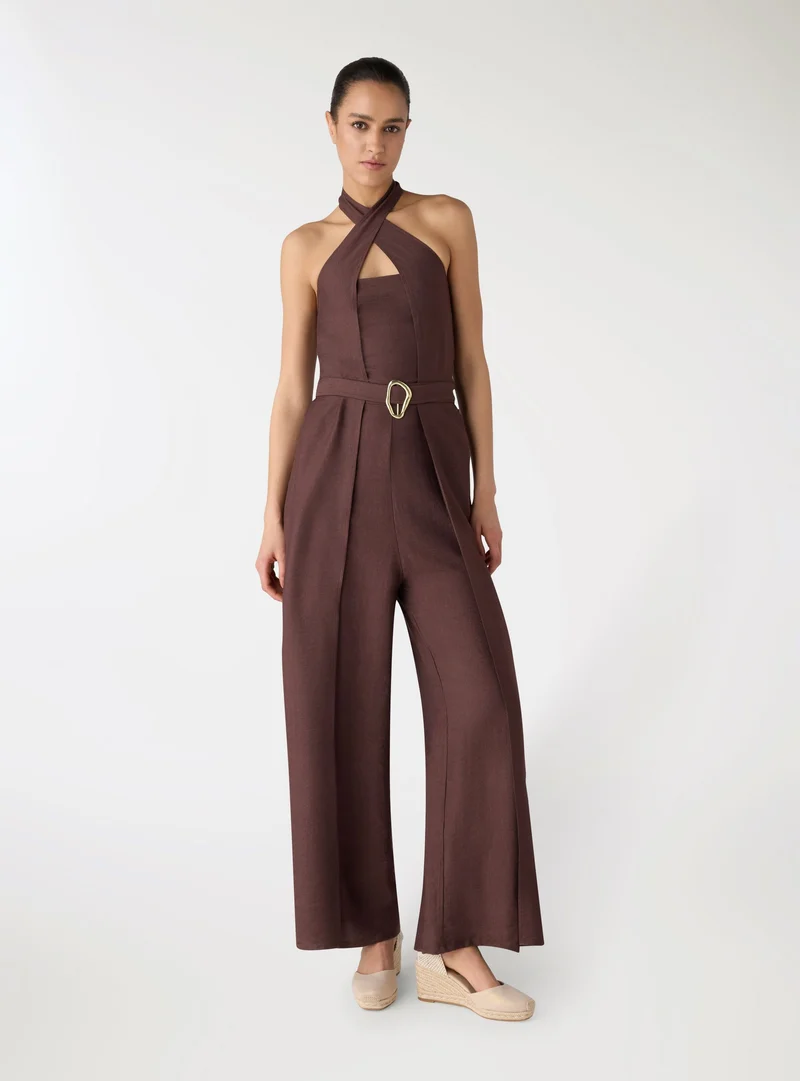 Tuta halterneck con cintura gioiello