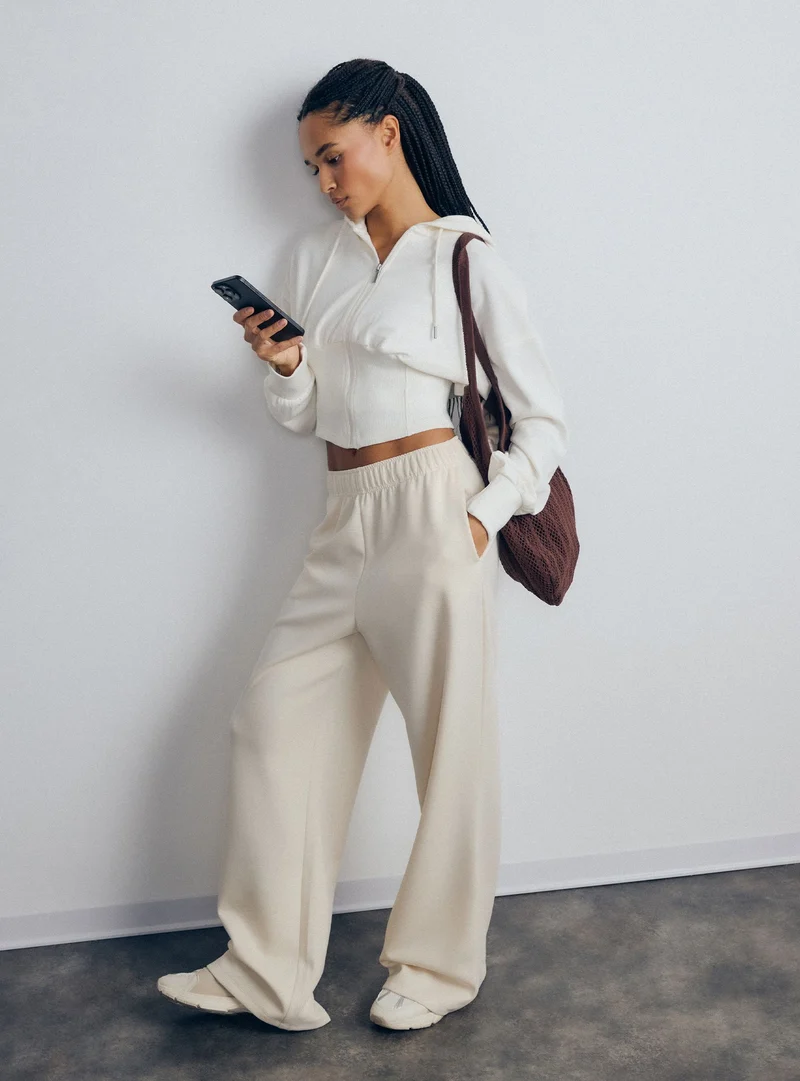 Pantaloni tuta wide leg a tinta unita