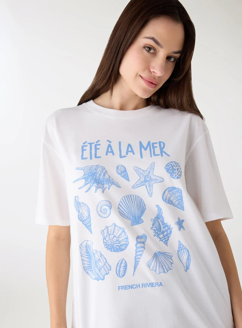 T-shirt con stampa conchiglie