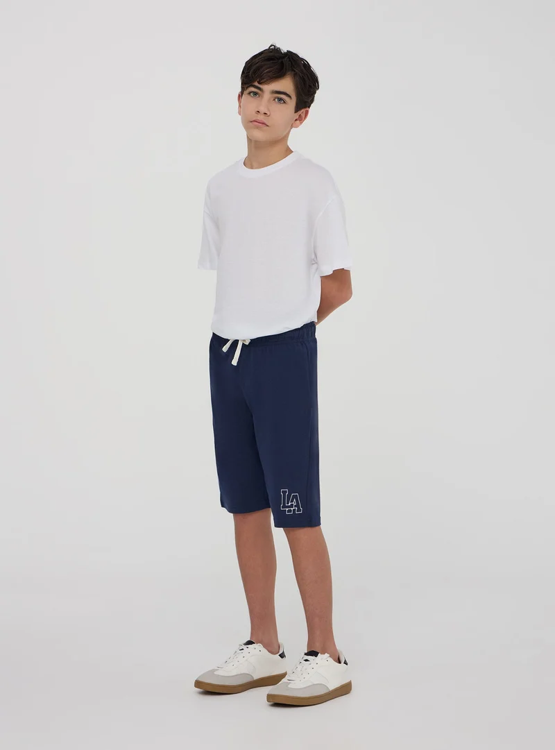 Pantaloncini tuta con stampa