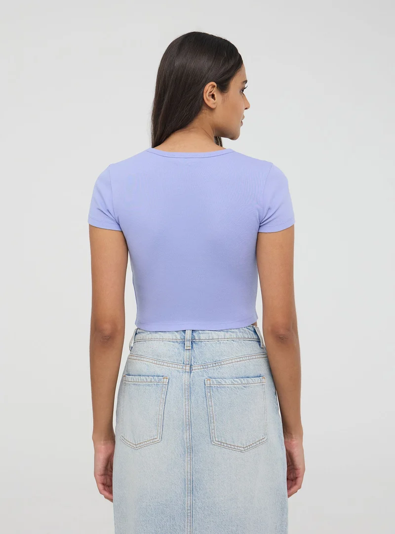 T-shirt con stampa college