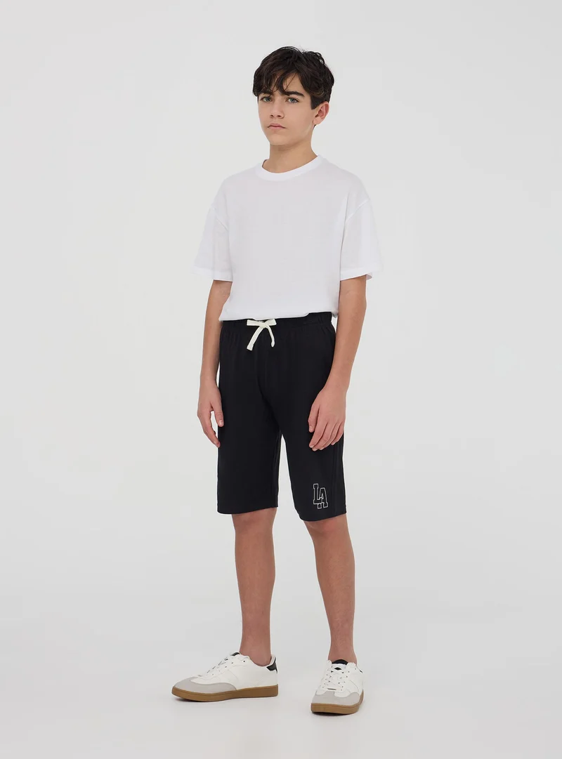 Pantaloncini tuta con stampa