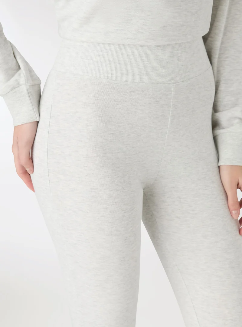 Leggings a zampa tinta unita