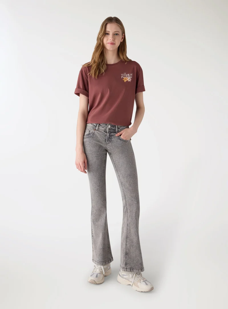 T-shirt ampia con stampa tropicale floreale