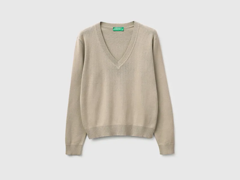 Maglia beige in cotone tricot con scollo a V