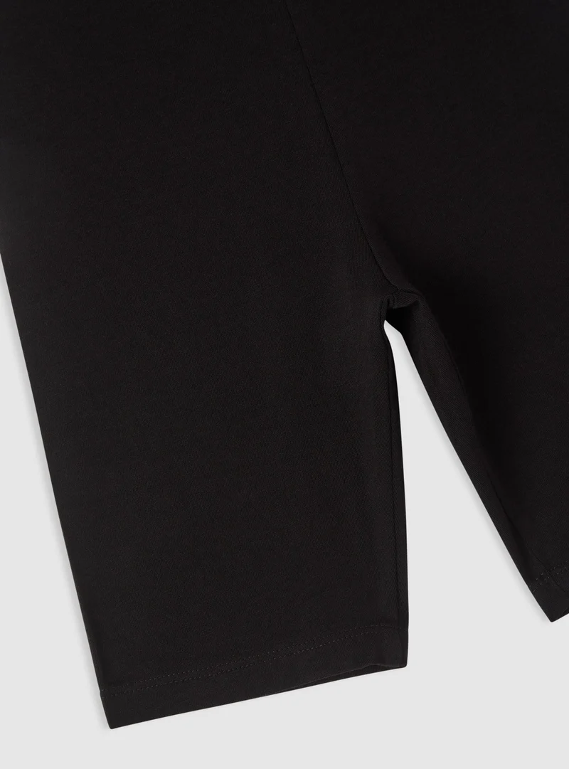 Leggings corti tinta unita
