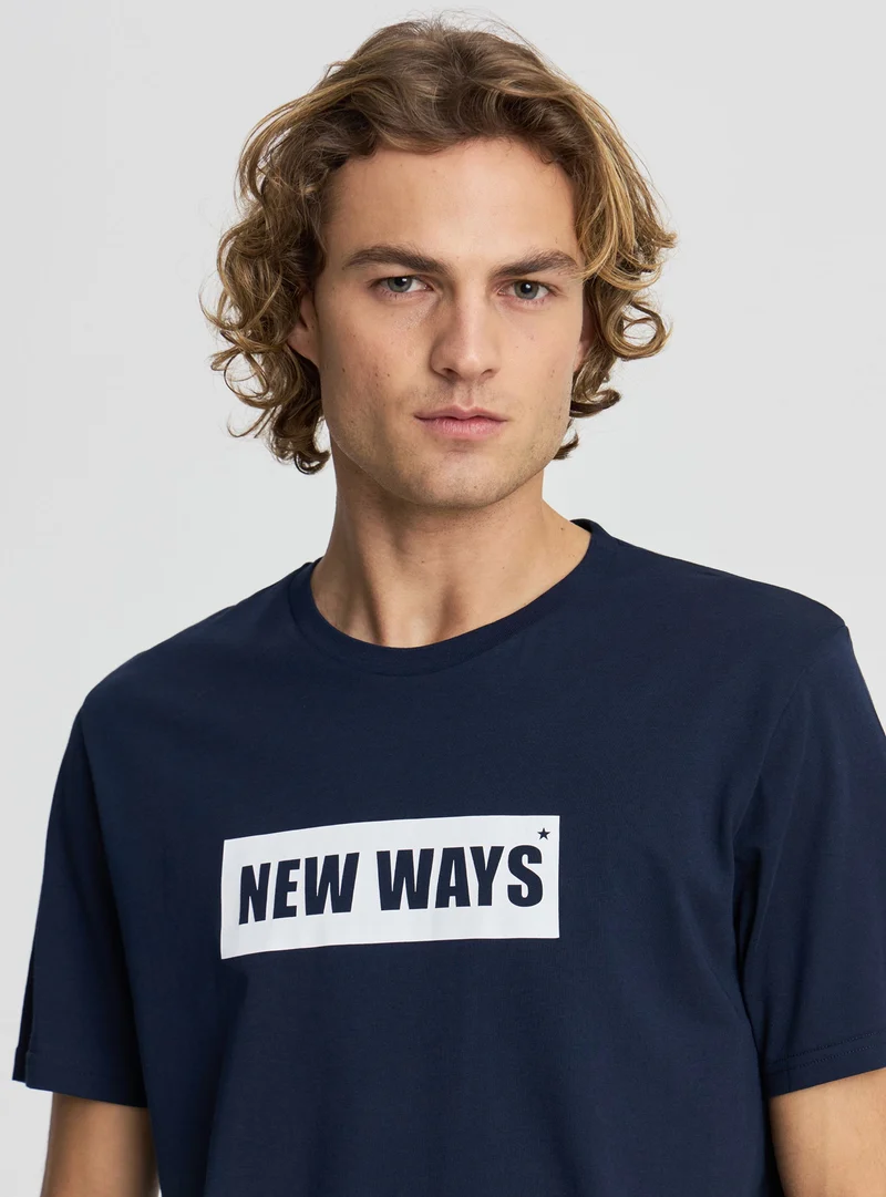 T-shirt con scritta
