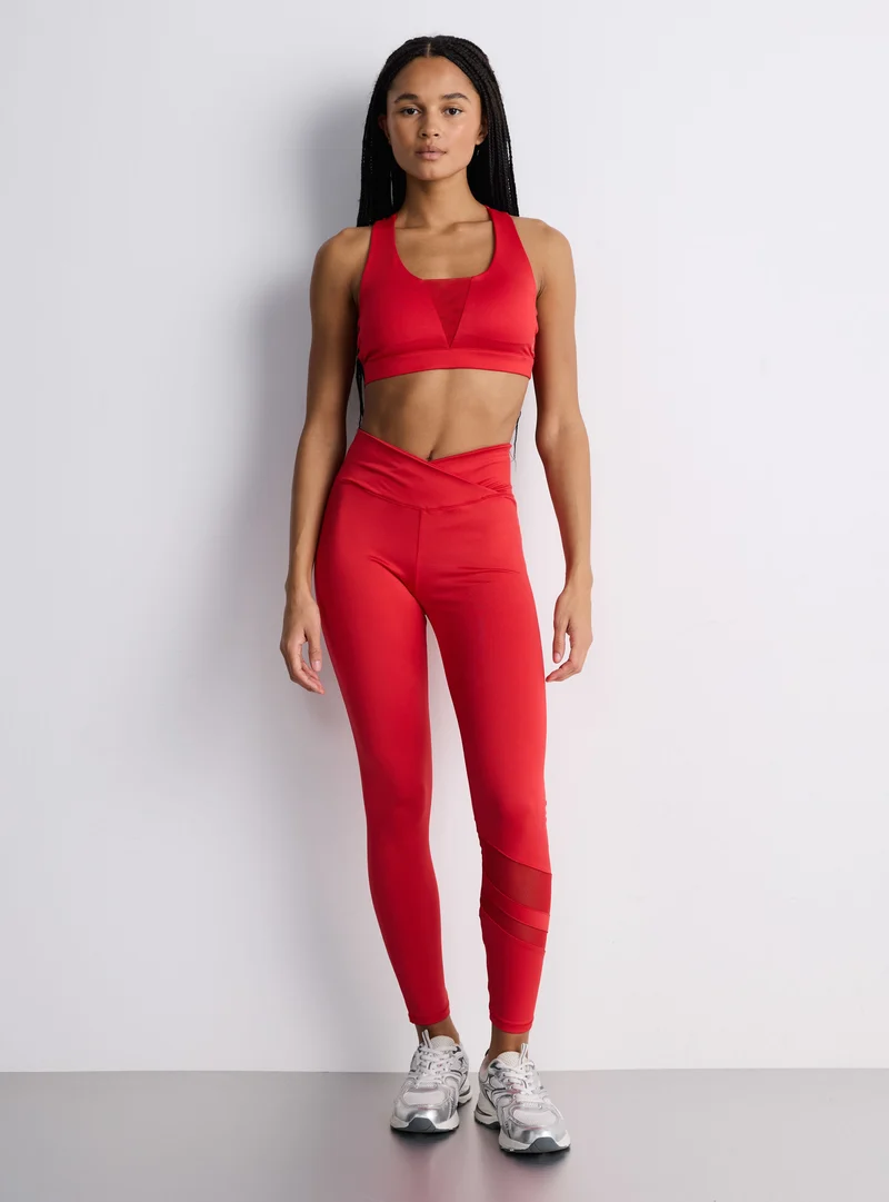 Leggings sportivo con inserto in tulle