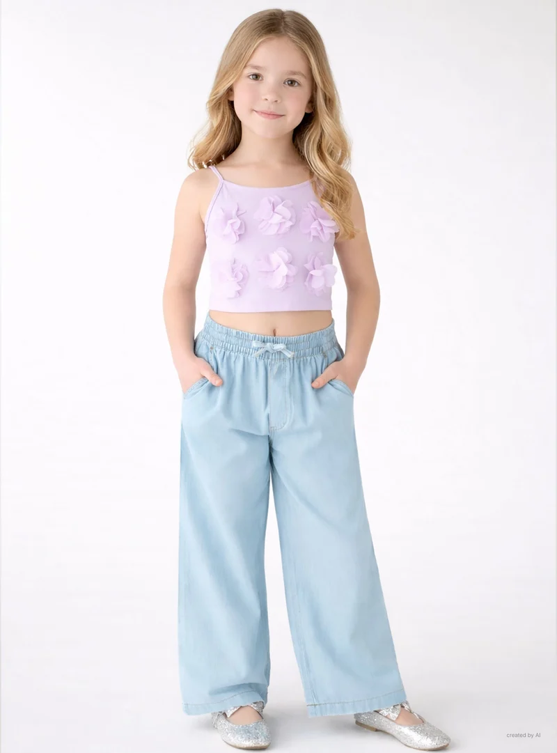 Jeans wide leg con vita elasticizzata e coulisse