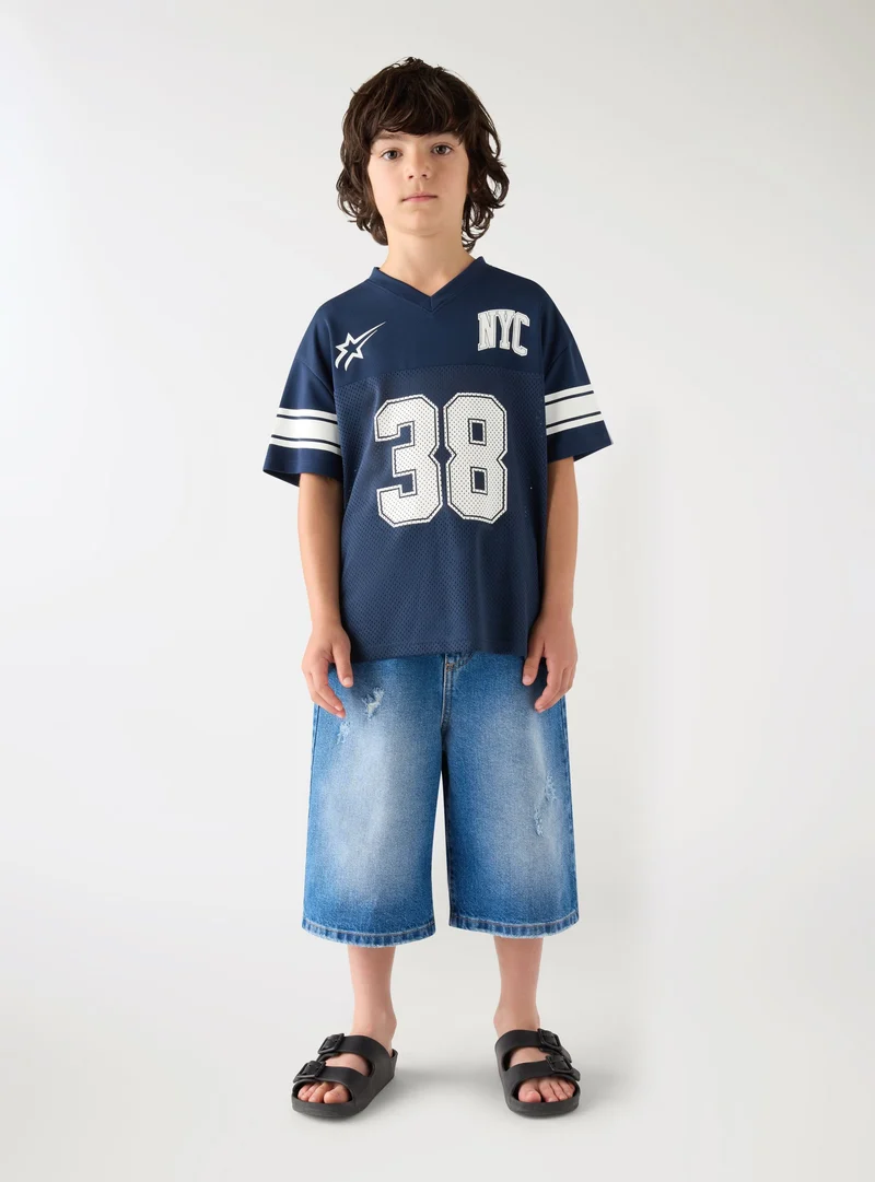 T-shirt sportiva con stampa numero e scritta