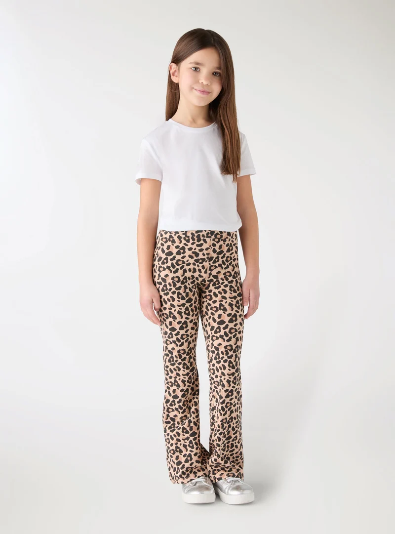 Leggings lunghi a zampa animalier