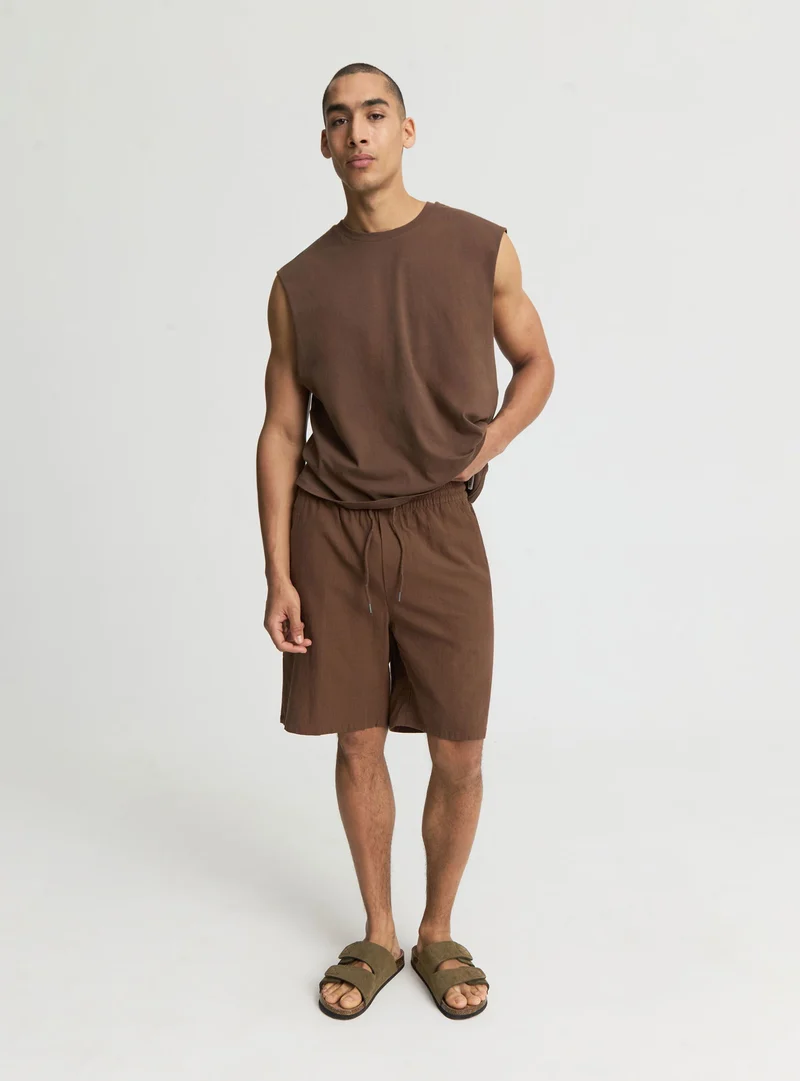 Pantaloncini tinta unita con coulisse