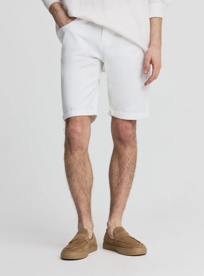 Pantaloncini a 5 tasche con risvolto