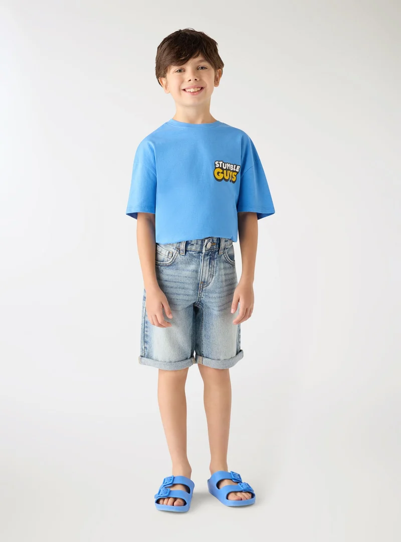 Pantaloncini jeans con strappi