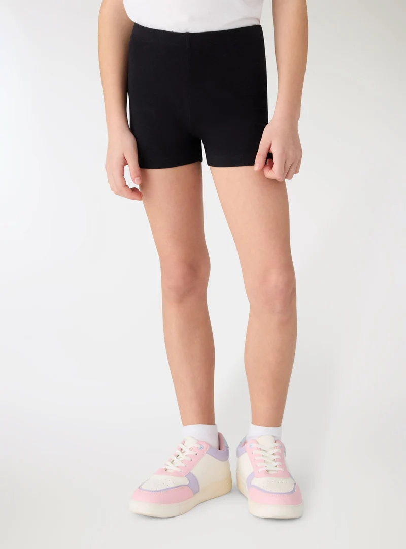 Leggings corti a tinta unita