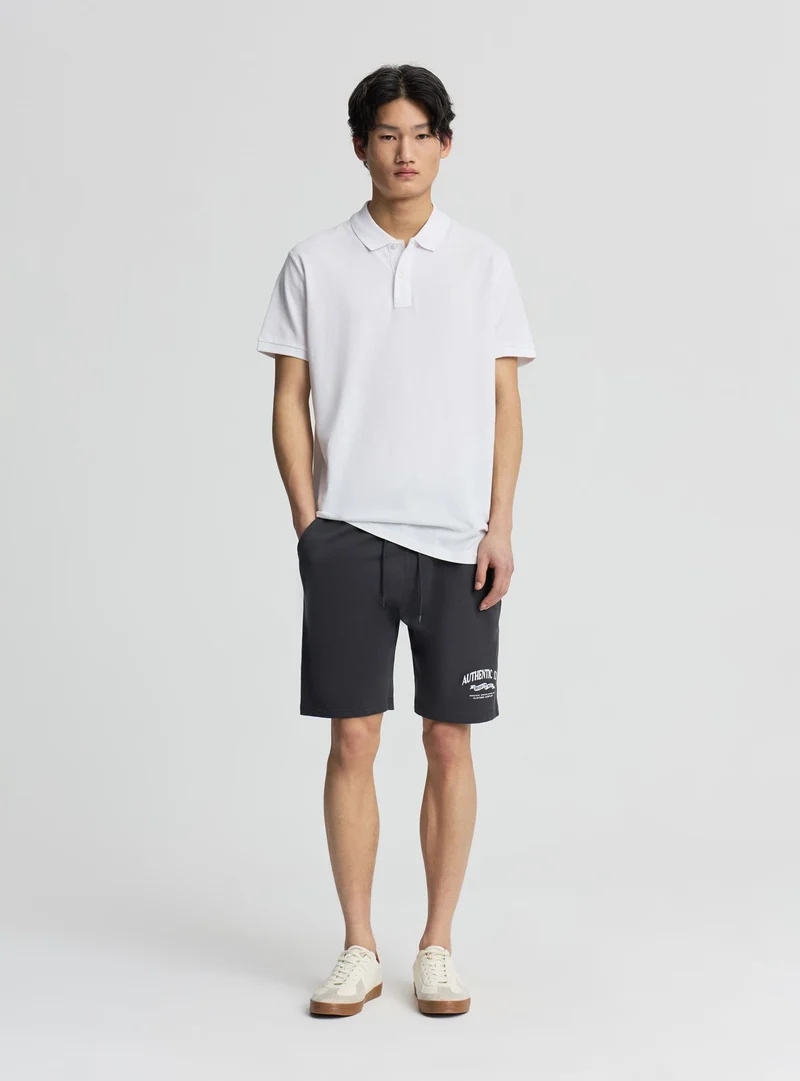 Bermuda tuta con coulisse e stampa