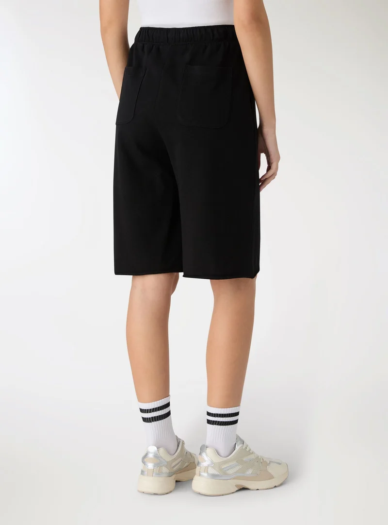 Jorts in felpa a tinta unita