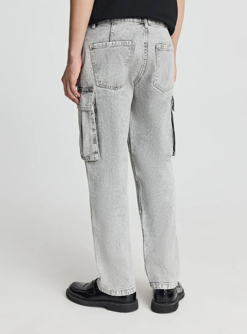 Jeans over cargo a tinta unita