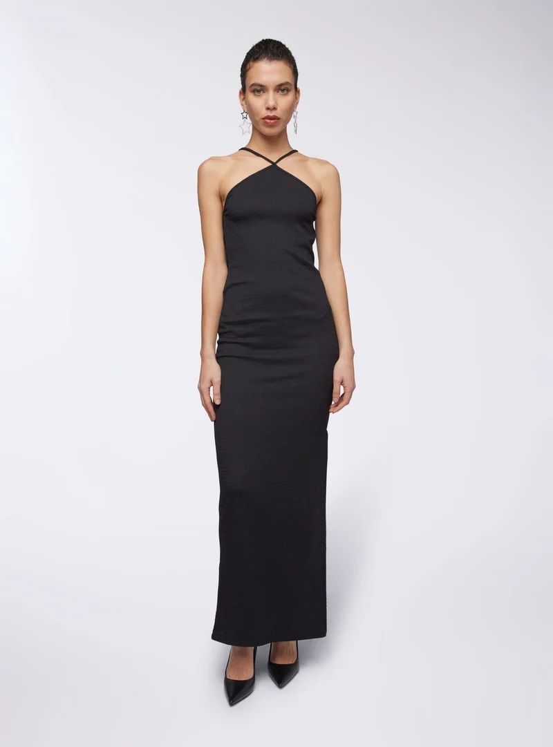 Vestito halterneck aperto sul retro