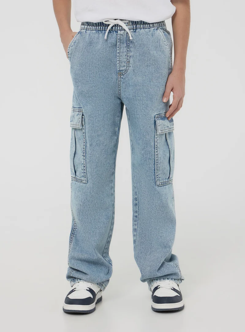Jeans cargo wide leg con coulisse