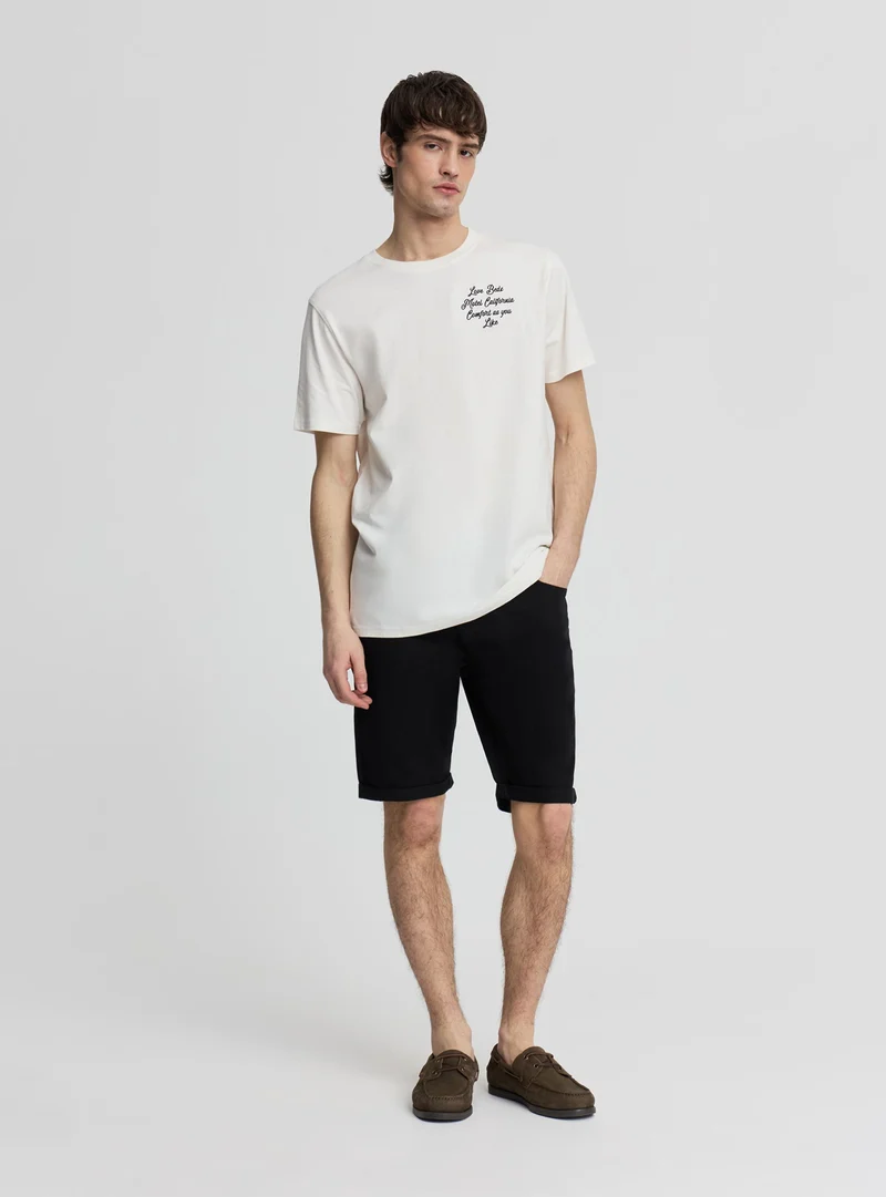 Pantaloncini a 5 tasche con risvolto