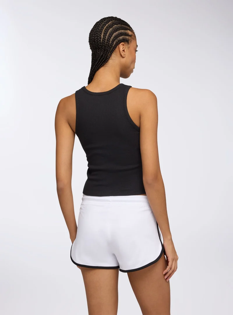 Shorts tuta leggeri con profili e stampa college