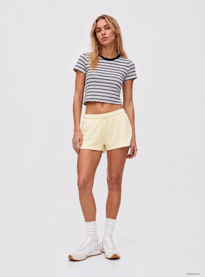 Pantaloni tuta corti vita alta