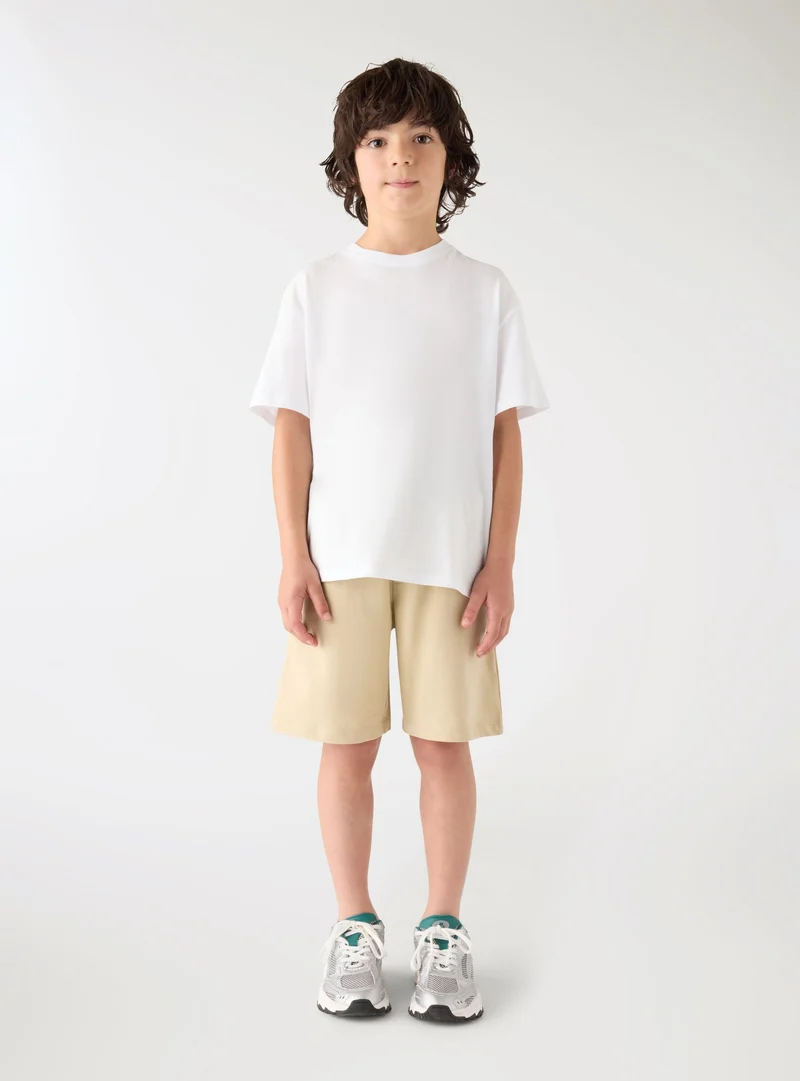 Pantaloni tuta corti con coulisse