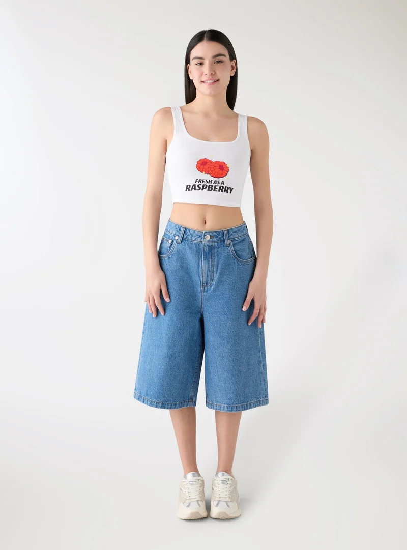 Shorts bermuda in denim con stampa fragola TRNPOPLAB