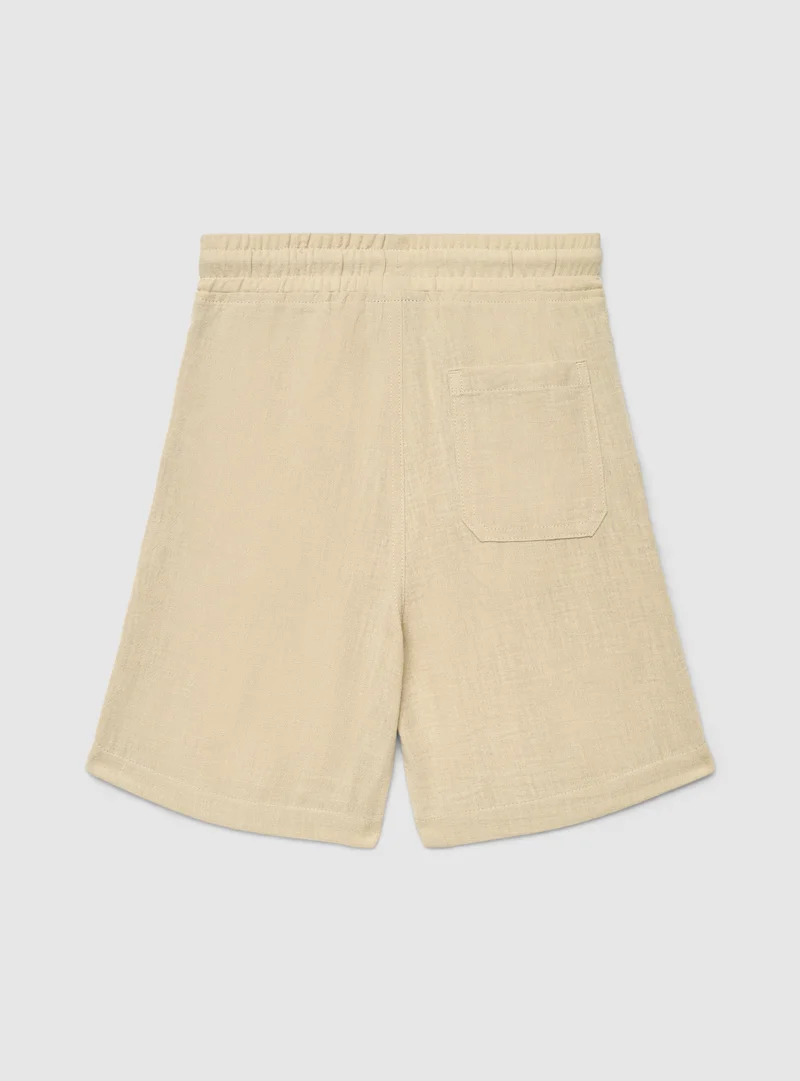 Pantaloncini jogger a tinta unita effetto lino