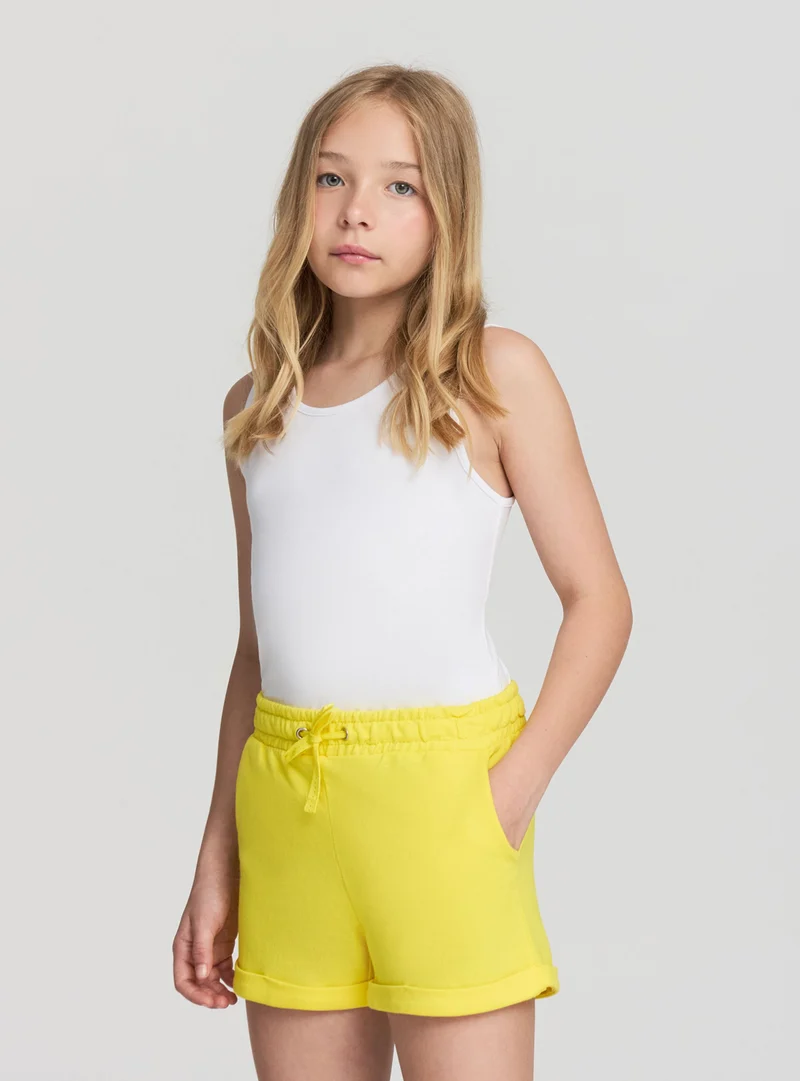 Shorts tuta con coulisse e risvolto