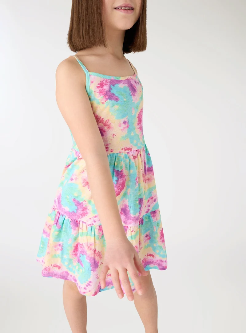 Vestito con stampa tie dye e balze
