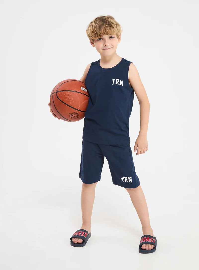 Pantaloncini sportivi con coulisse e scritta