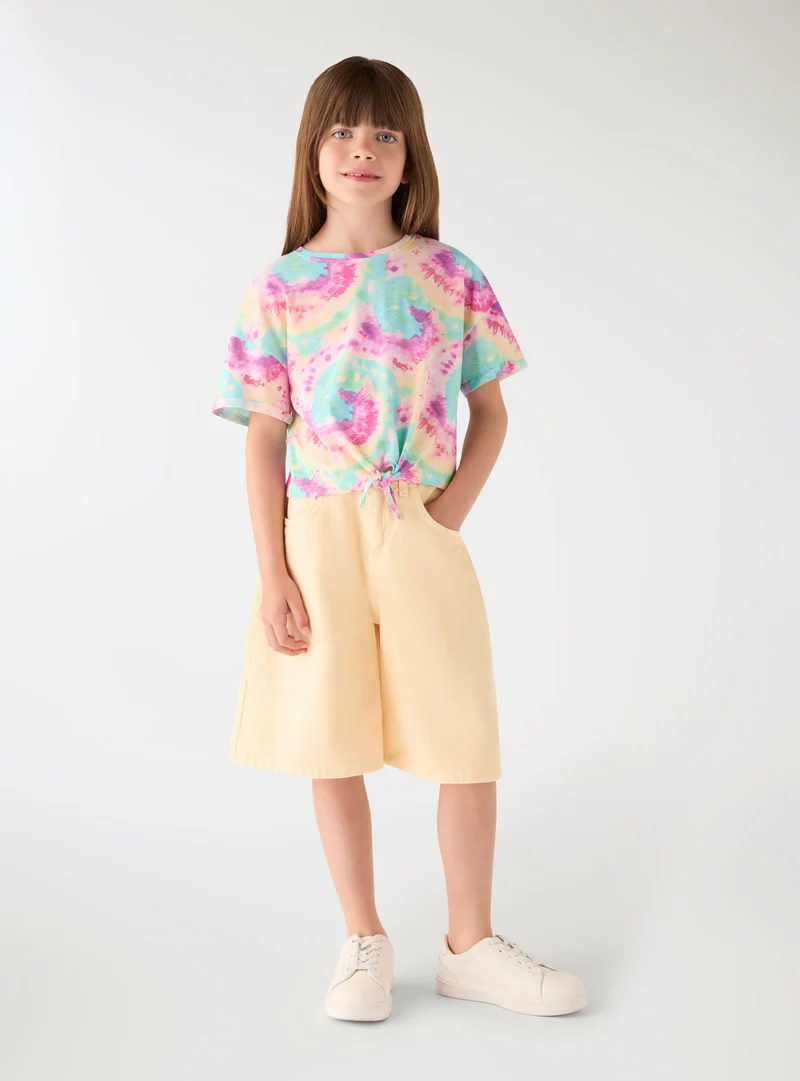T-shirt crop tie-dye con nodo frontale