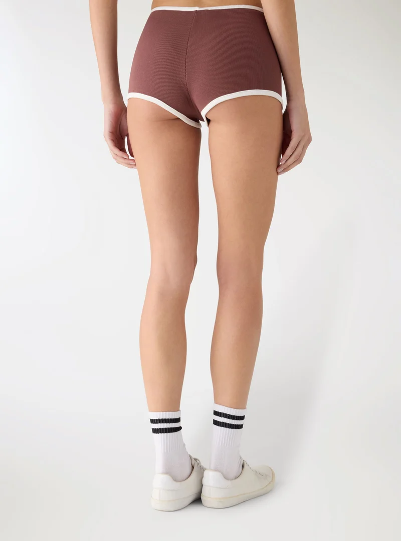 Culotte a costine profili a contrasto