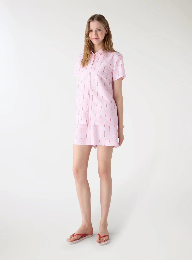 Shorts a righe con scritta allover TRNPOPLAB