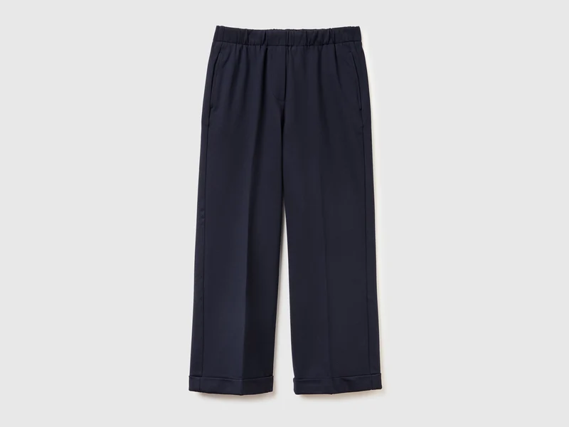 Pantaloni con elastico in vita e risvolto