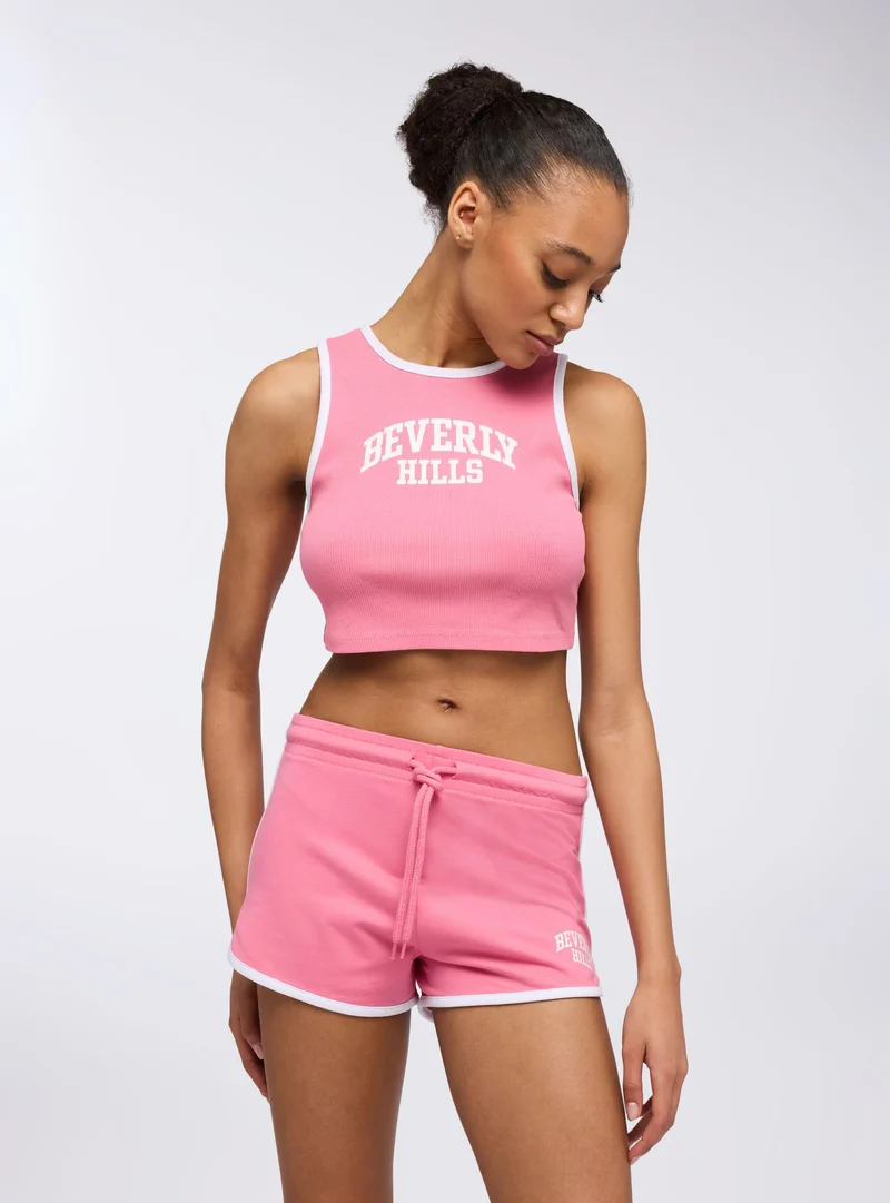 Shorts tuta leggeri con profili e stampa college