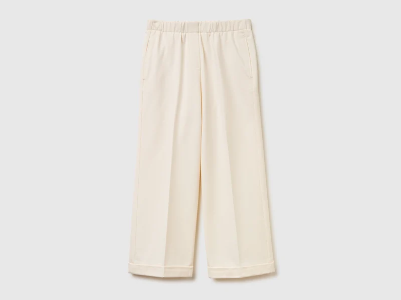 Pantaloni con elastico in vita e risvolto