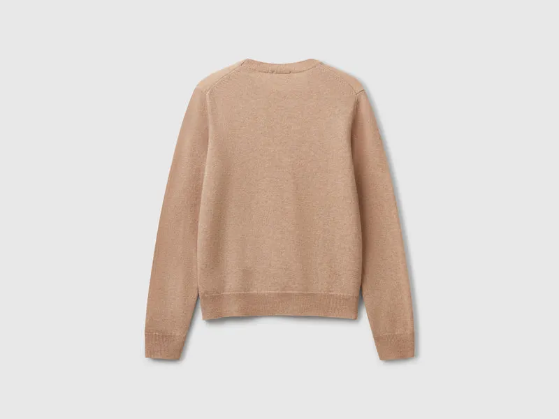 Maglia girocollo beige in pura lana Merino
