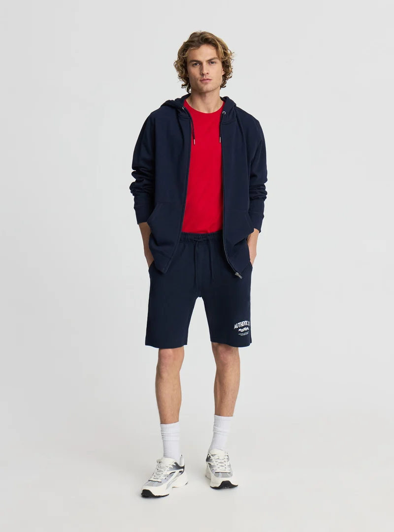 Pantaloncini tuta con stampa e coulisse