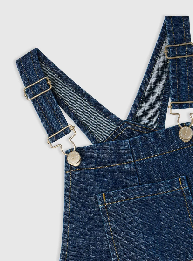 Salopette jeans con tasche