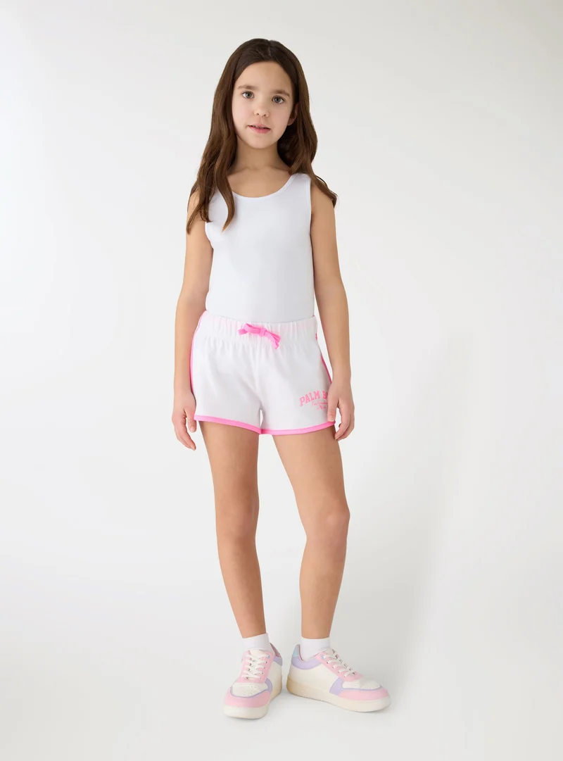 Shorts tuta con coulisse e profili a contrasto