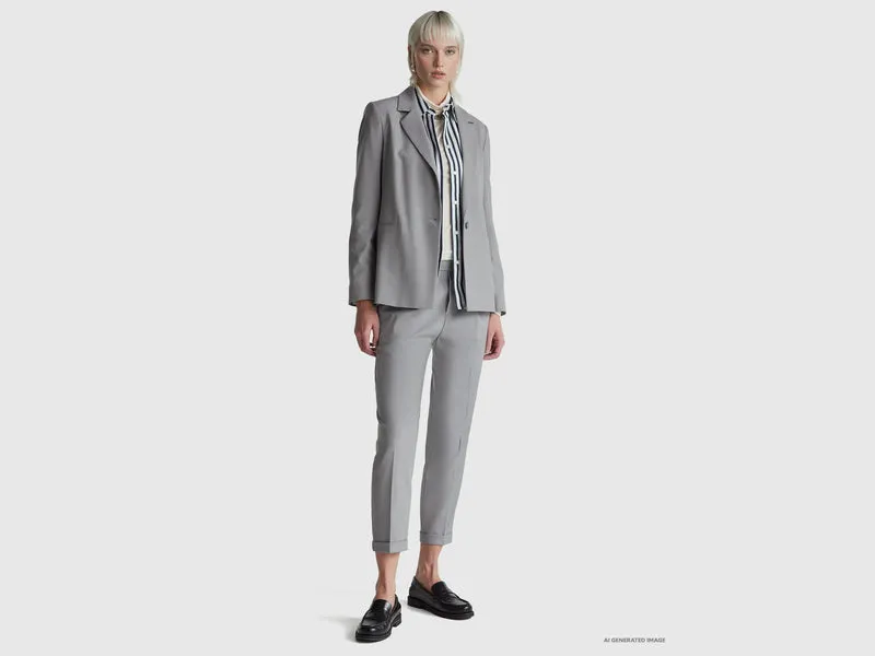 Pantaloni con risvolto in misto viscosa stretch