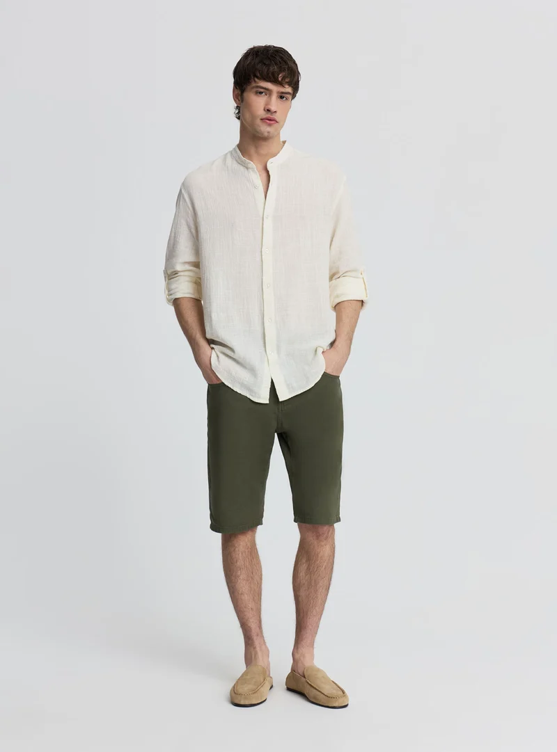 Pantaloncini a 5 tasche con risvolto