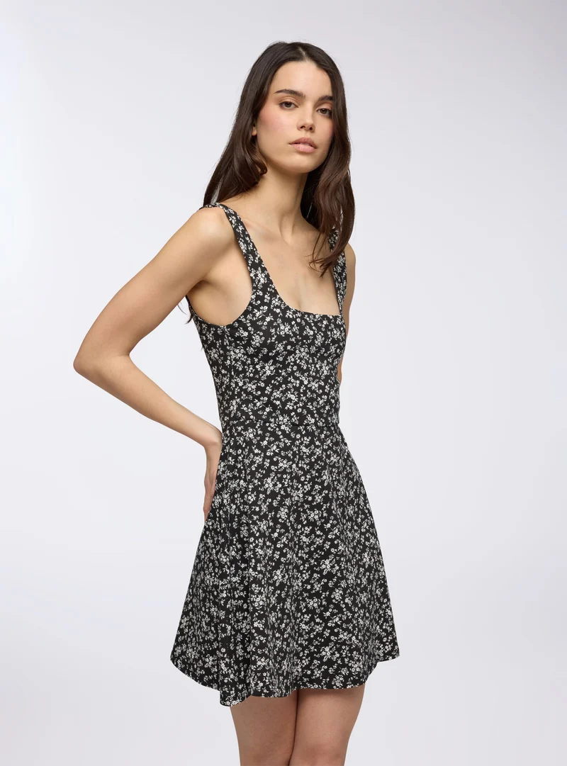 Vestito skater con fantasia floreale
