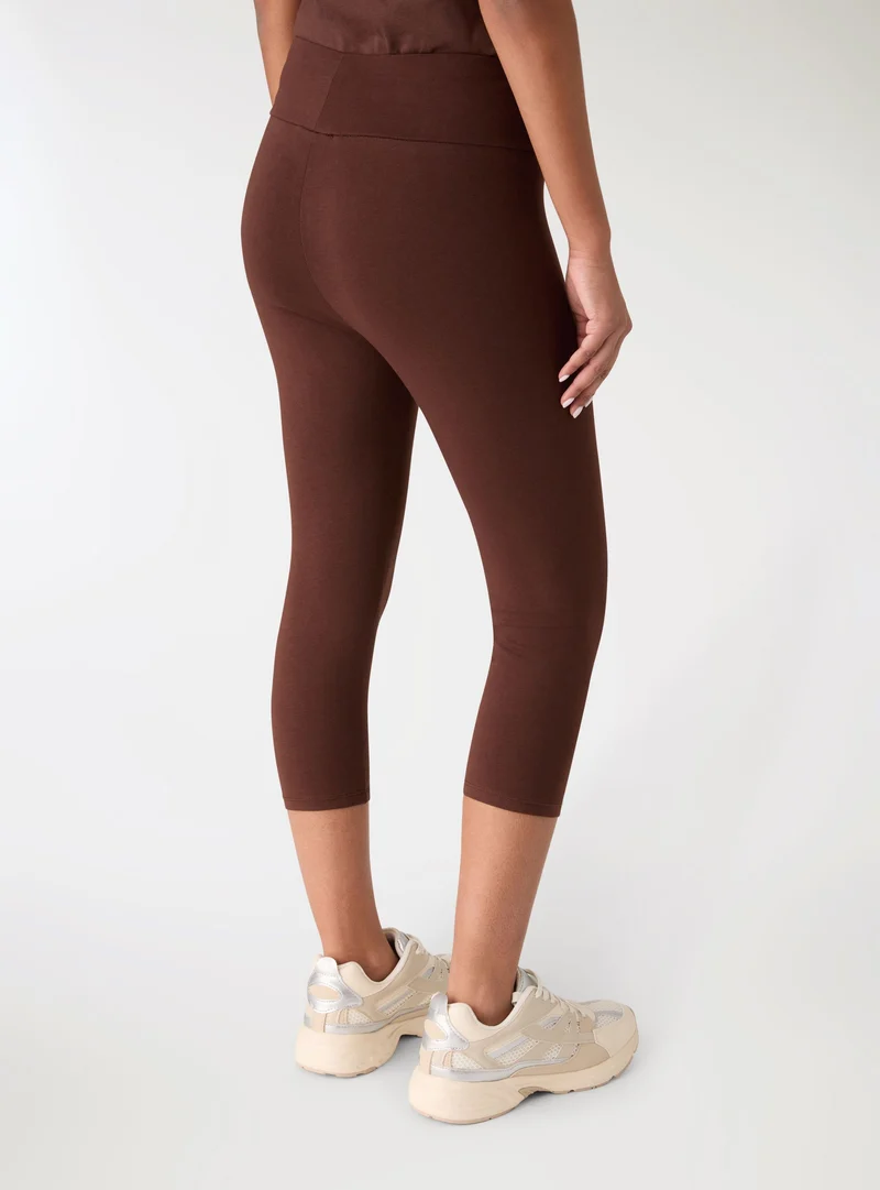 Leggings capri a tinta unita