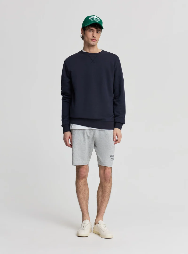 Pantaloncini tuta con coulisse e stampa