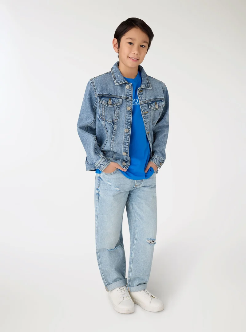 Jeans jogger con coulisse e strappi
