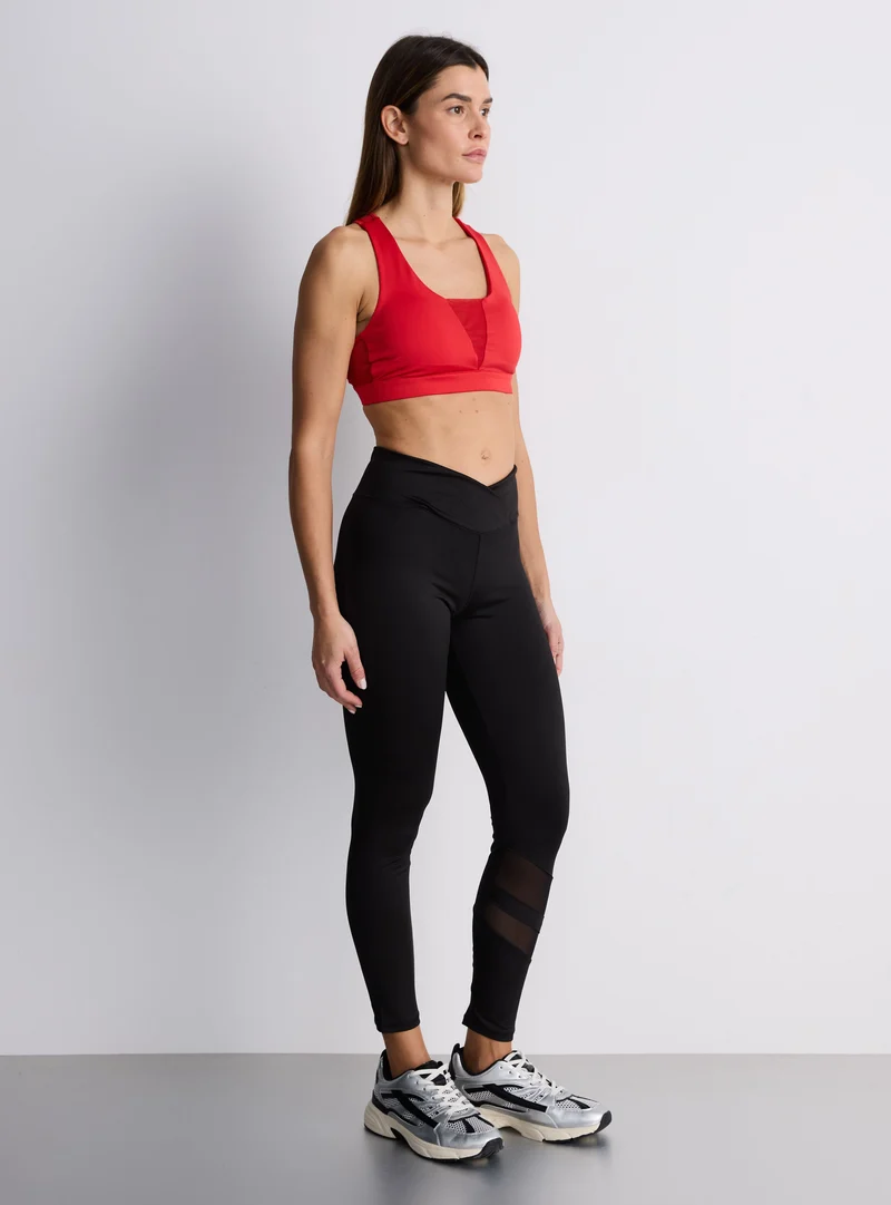 Leggings sportivo con inserto in tulle